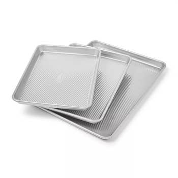 Three rimmed sheet pans