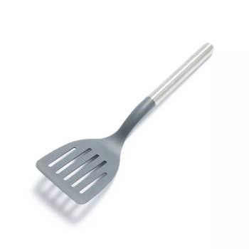 Slotted spatula with a stainless steel handle, suitable for nonstick cookware