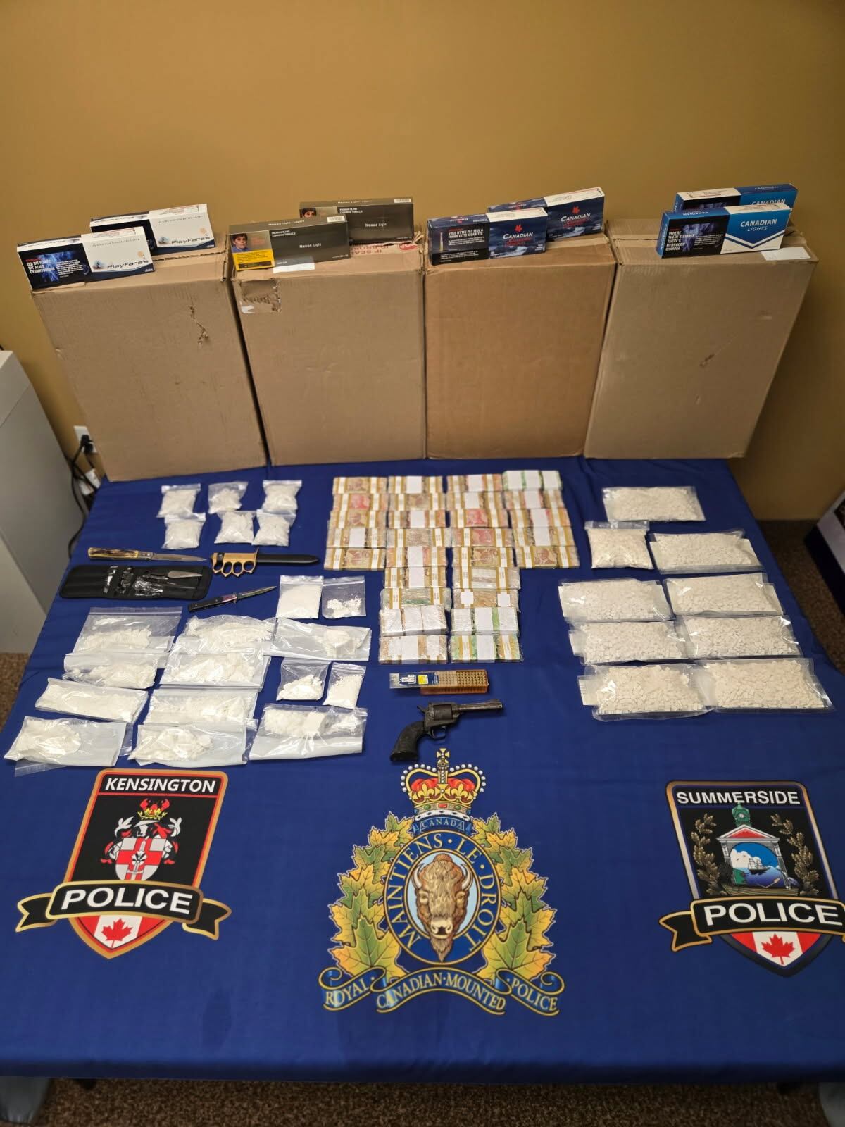Man facing 19 charges after PEI police seize drugs, cash, weapons and ...