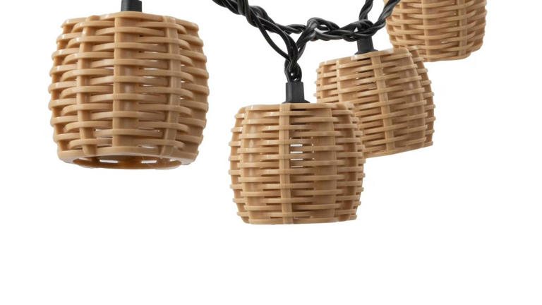 Walmart's $16 rattan string lights add a homey ambiance to your backyard