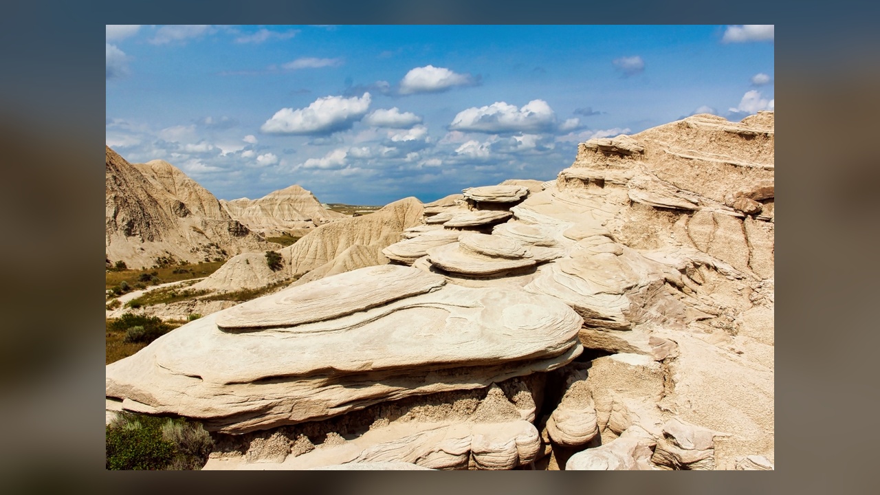 Giant mushroom rocks and prehistoric bones wait at the end of a ...