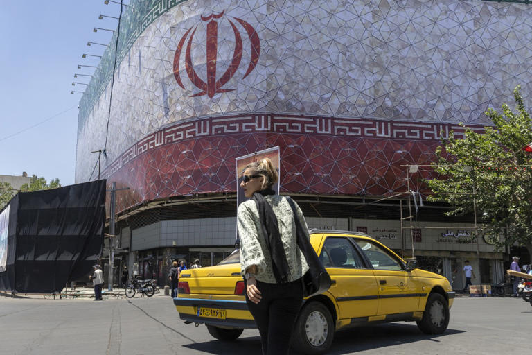 The Iranian flag on a building in Tehran, Iran’s capital.