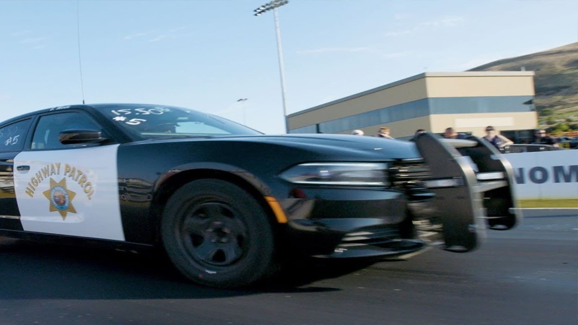 Top the Cops program turns racing into a positive challenge