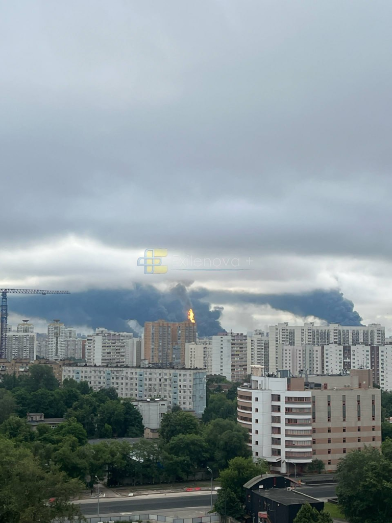 Smoke rises over a residential building following a drone attack in Moscow.