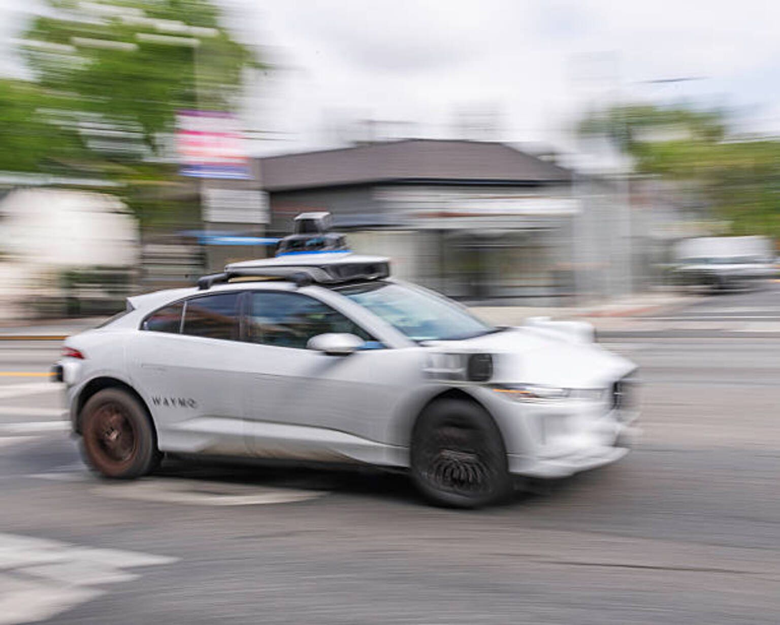Alphabet's Waymo recalls 3,871 robotaxis over construction zone ...