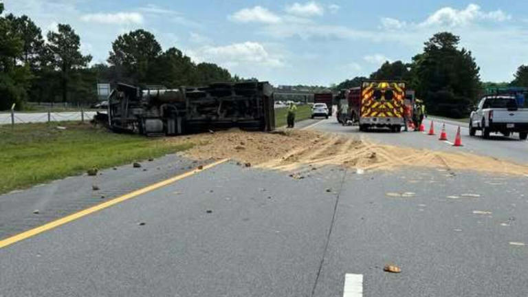 1 injured after dump truck carrying sand overturns on Highway 31 in ...