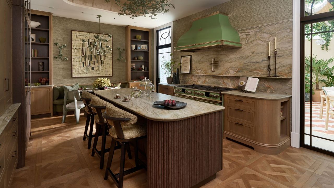 A wooden kitchen with marble countertops