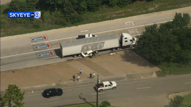 Robbery suspects' getaway car hits two 18-wheelers in failed escape ...