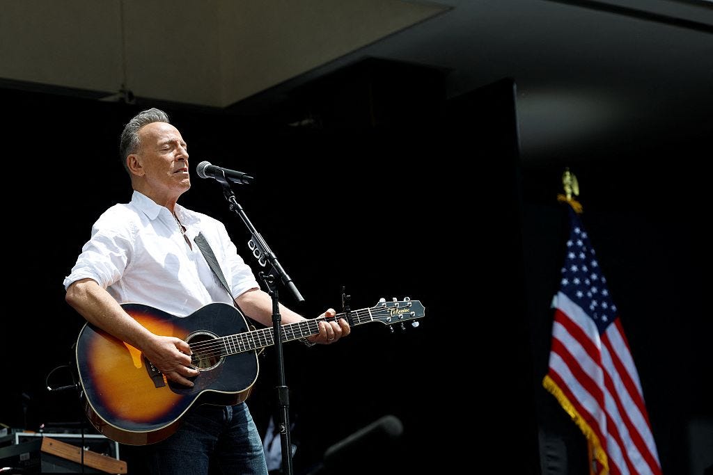 Bruce Springsteen serenades Obama Center opening, what did Boss say?