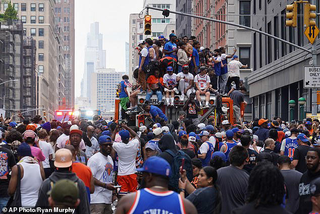 Knicks fan is slashed in the neck with glass bottle as NBA title parade ...