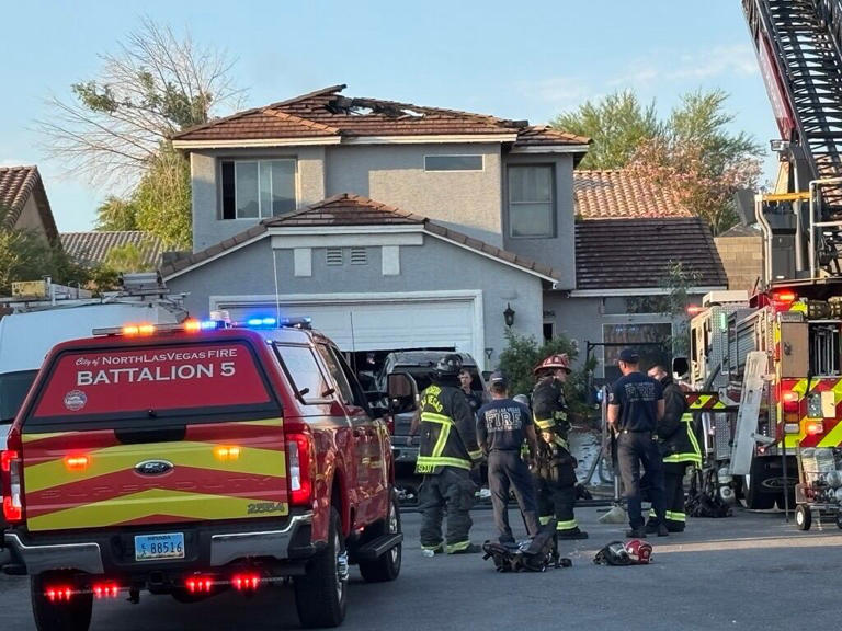 Family of four displaced, two dogs rescued after North Las Vegas house fire