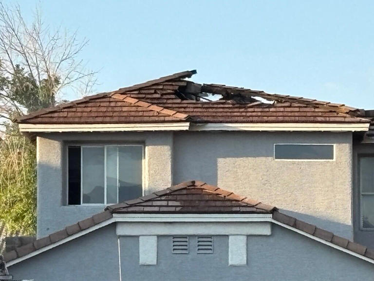 Family of four displaced, two dogs rescued after North Las Vegas house fire