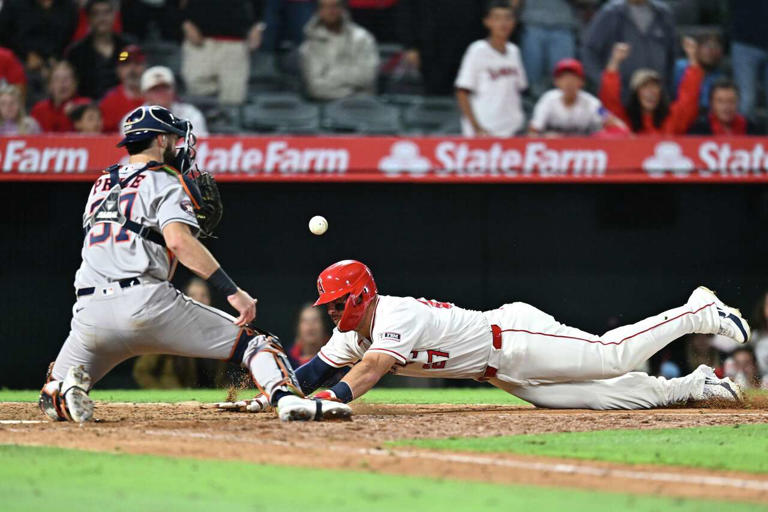 Two plays at the plate involving two stars prove decisive in Houston ...