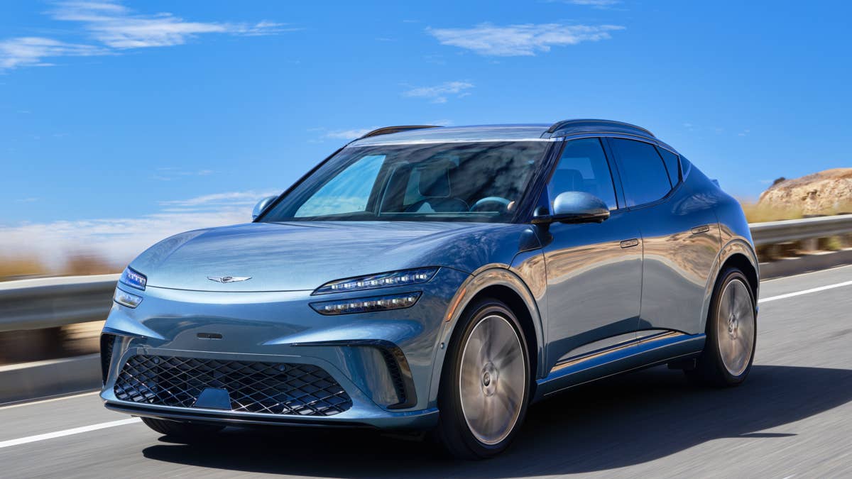 2026-genesis-gv60-blue-front-angled-view-driving