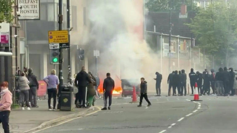 Protesters torch buildings and vehicles, block roads over Belfast stabbing