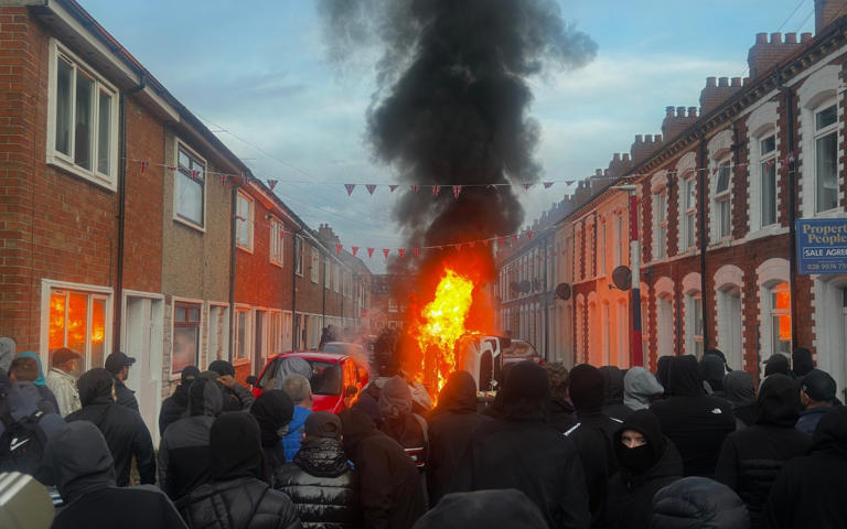 Protesters torched houses and set fire to a bus on Tuesday night - PA Wire