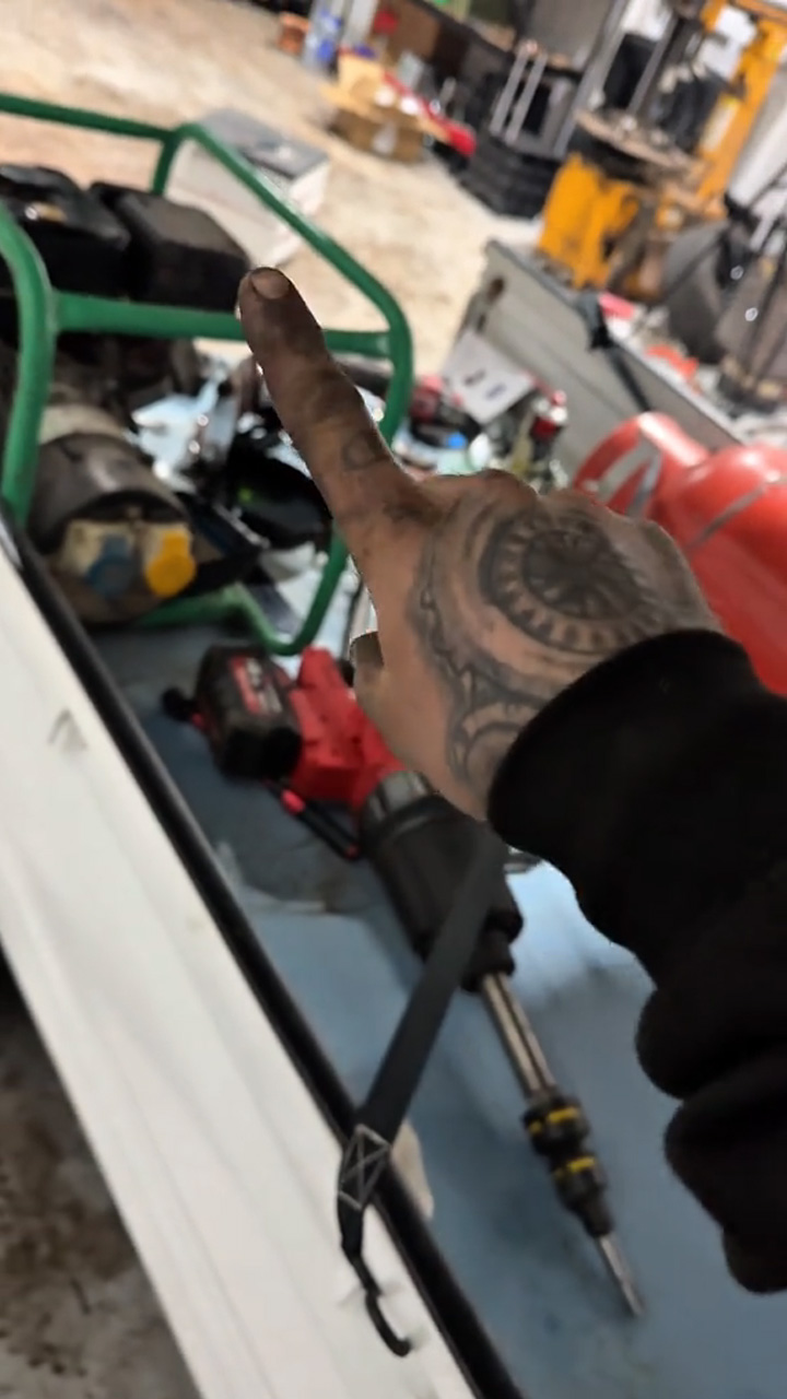 Inside a high intensity professional mechanic workshop