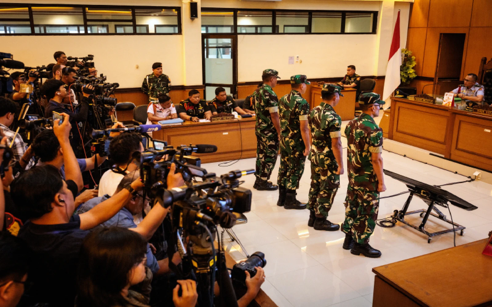 Military court jails Indonesian soldiers over acid attack on activist