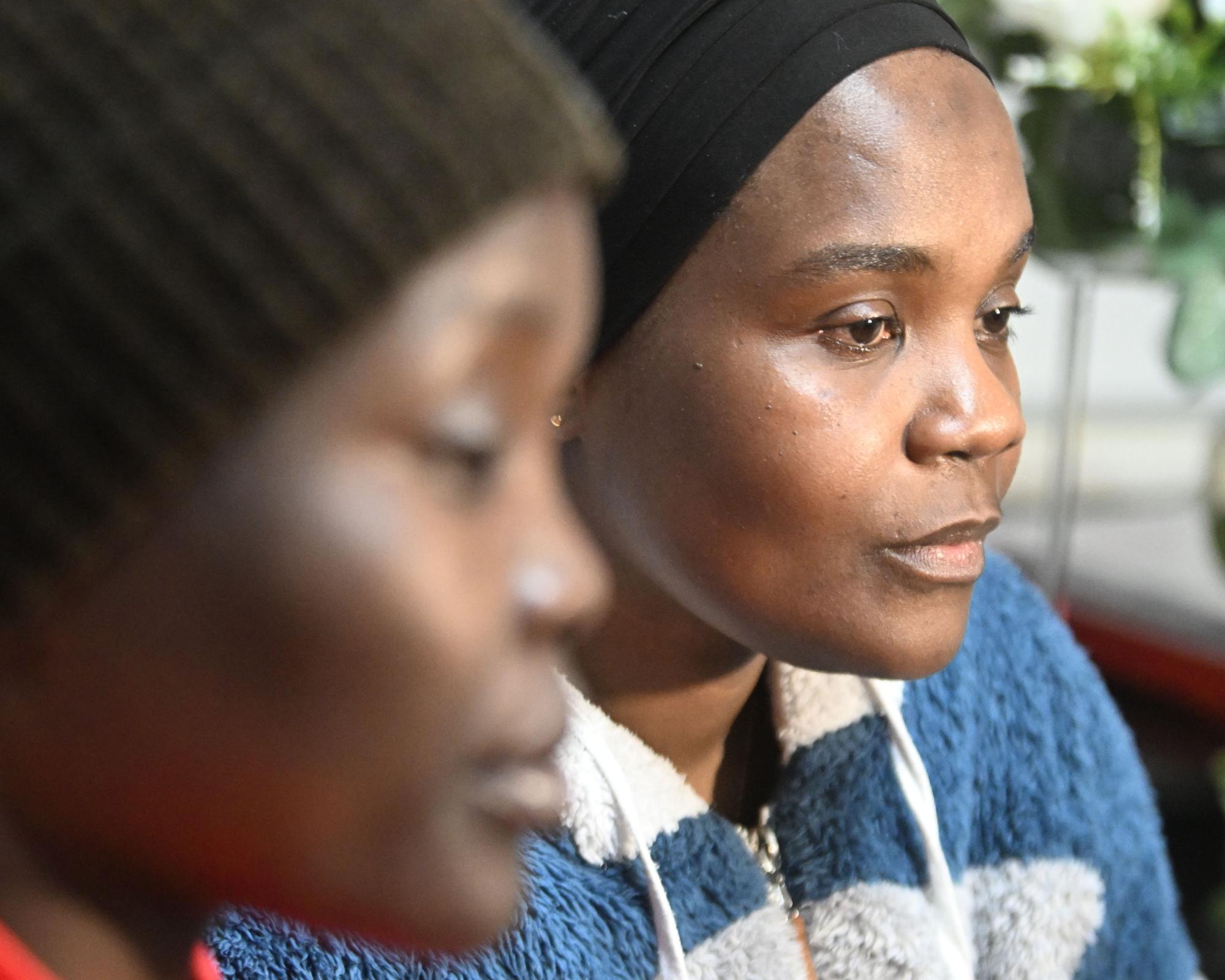 Stella Ariokot (left) and Sumayah Nakazibwe: ‘Someone rioting doesn’t know that the person they are targeting is actually looking after their mother or their granny.’ Photograph: Alan Lewis/Photopress Belfast/The Guardian