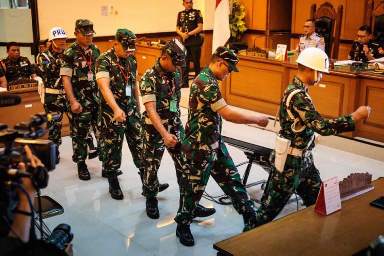 Military court jails Indonesian soldiers over acid attack on activist