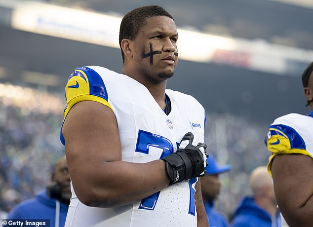 Alaric Jackson's domestic violence accuser claims she pleaded with him not to hurt her because she was pregnant 