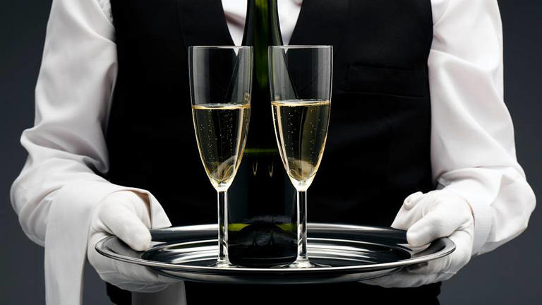 Why do butlers wear white gloves?