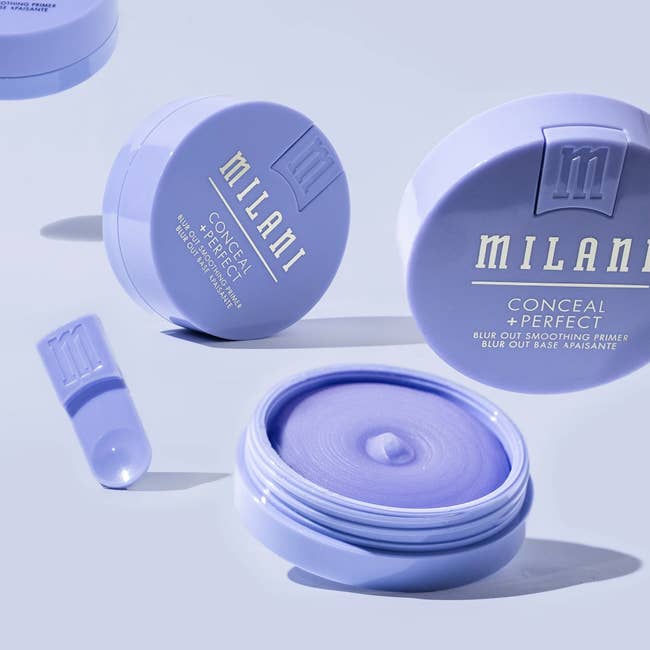 Milani Conceal + Perfect Blur Out Smoothing Primer containers are open and closed, showing texture. Suitable for makeup application