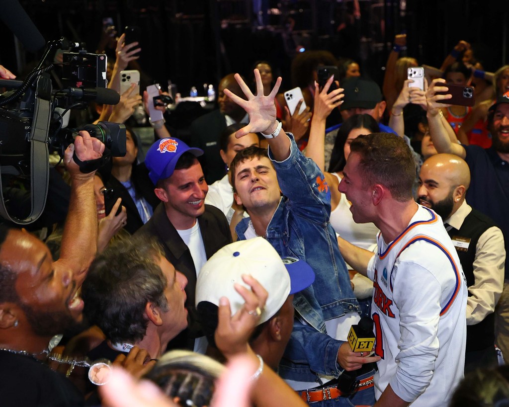 Timothee Chalamet rips off shirt, grabs microphone as Knicks ...