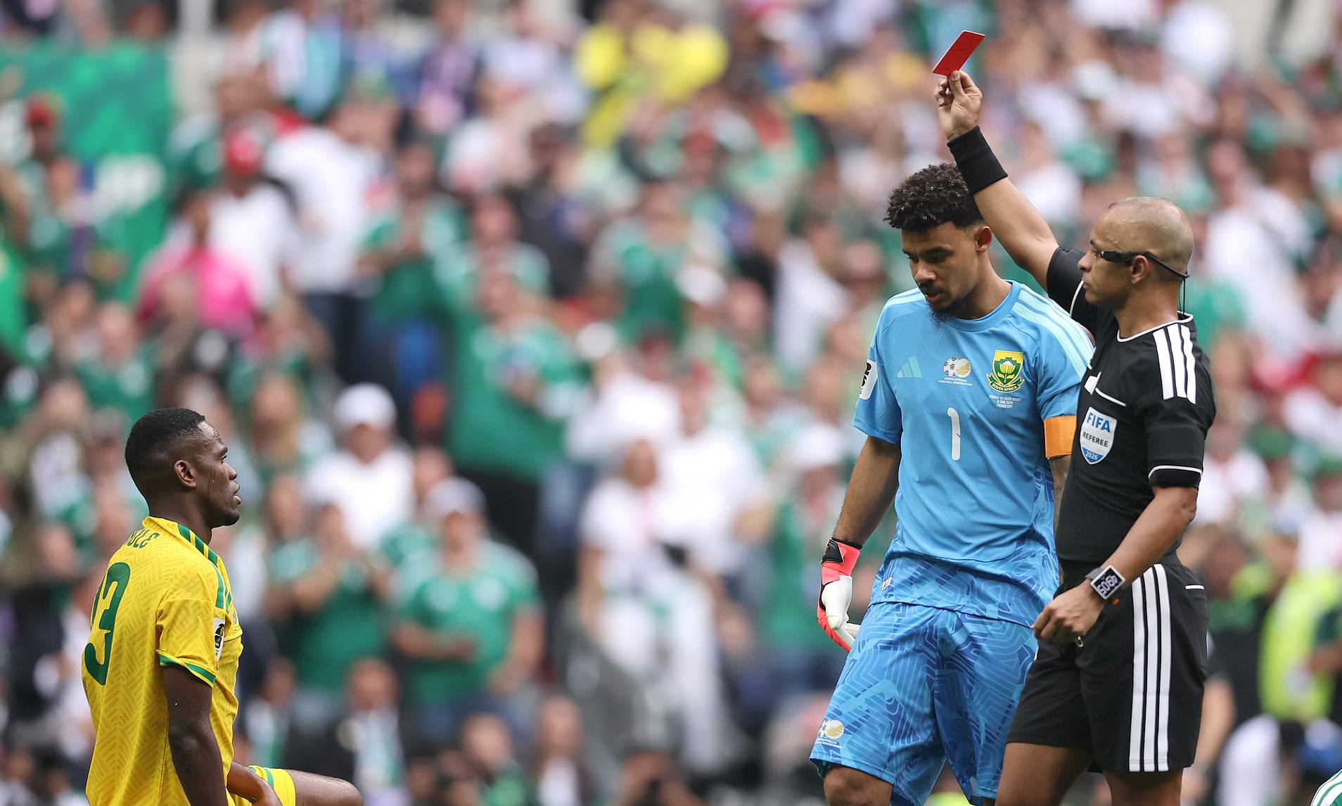 World Cup star's 50-minute first game nightmare: South Africa player is sent off after gifting goal