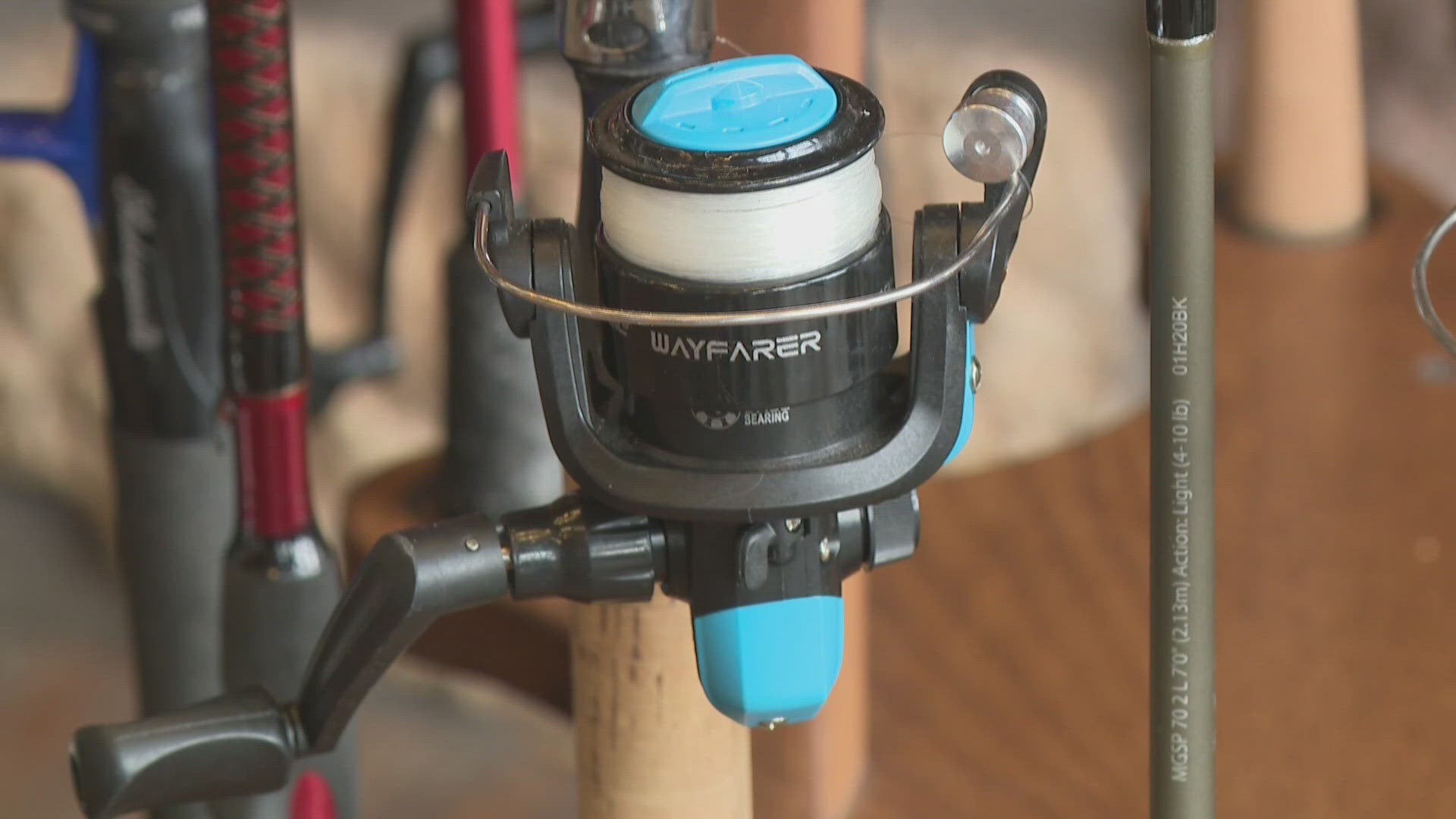 Bass Pro Shops donates fishing rods to youth groups