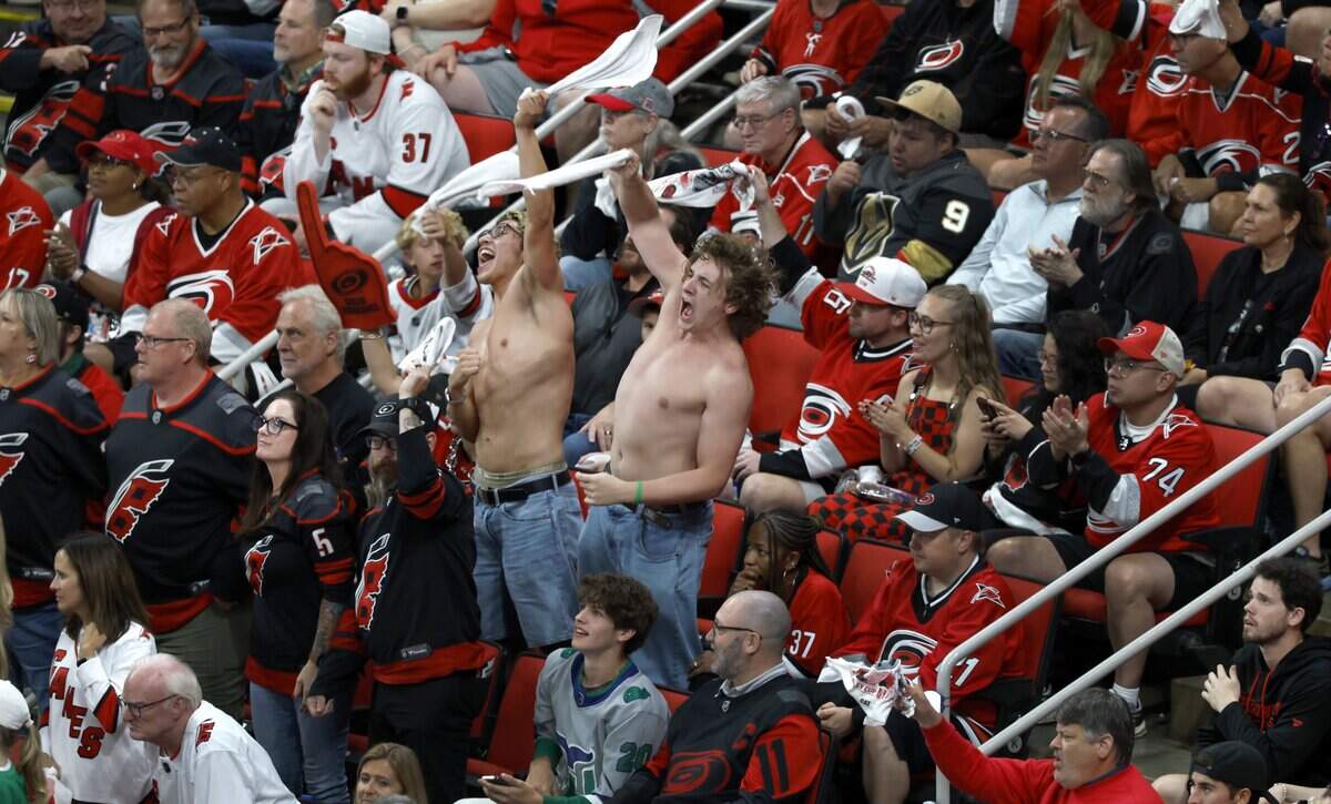 The 'tarps off' craze arrives in NC: Shirtless Canes fans have skin in ...