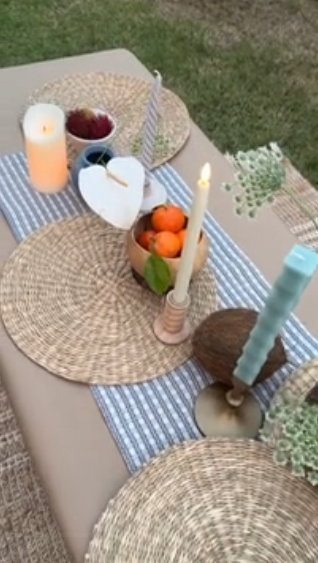 Styling a fruit and floral table display with natural beauty
