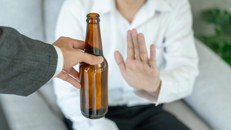 For those looking to protect their long-term health, researchers recommend cutting back to one drink or giving up alcohol altogether. iStock