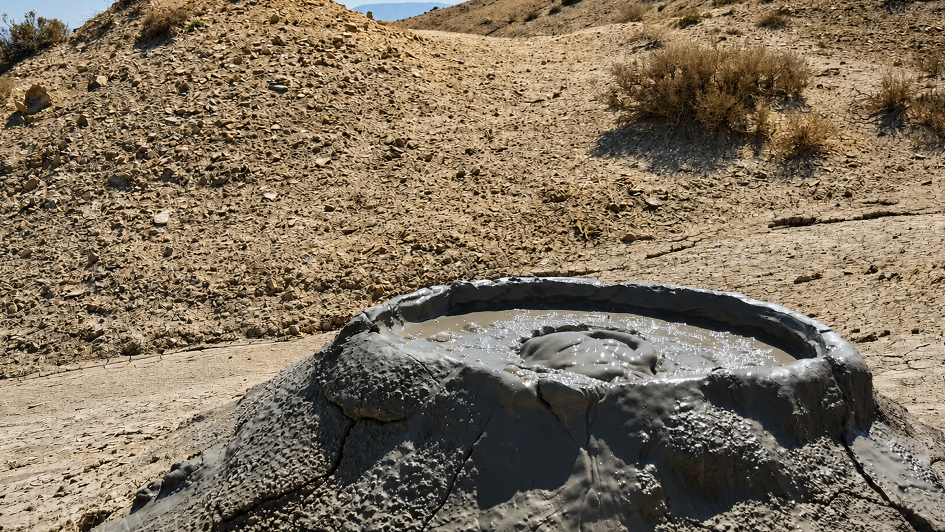 Where the earth pushes mud to the surface