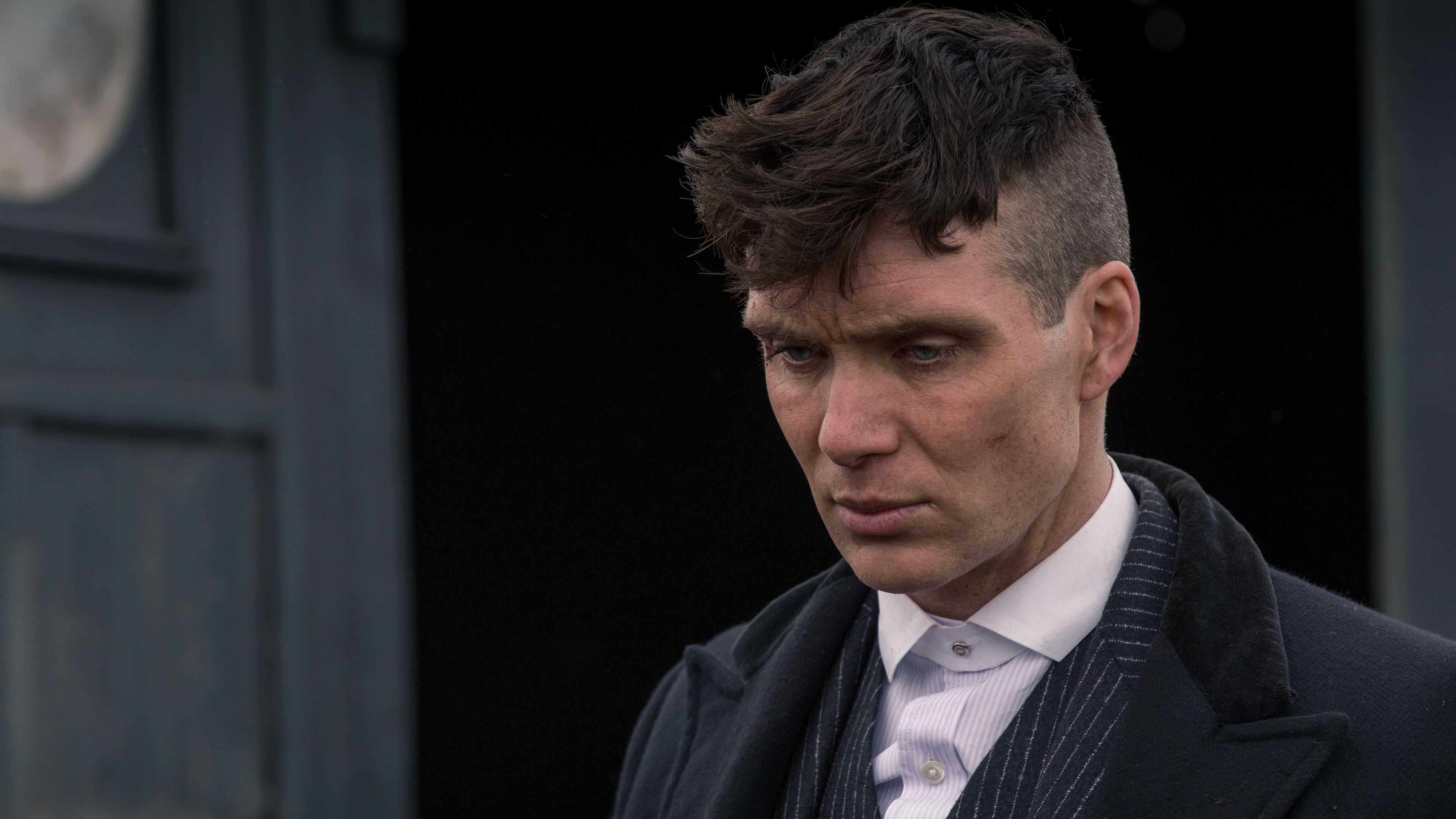 Tommy Shelby (Cillian Murphy) looking down in Peaky Blinders.