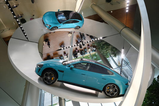 A Xiaomi SU7 Max car is displayed at the entrance to the Xiaomi EV Factory in Beijing.