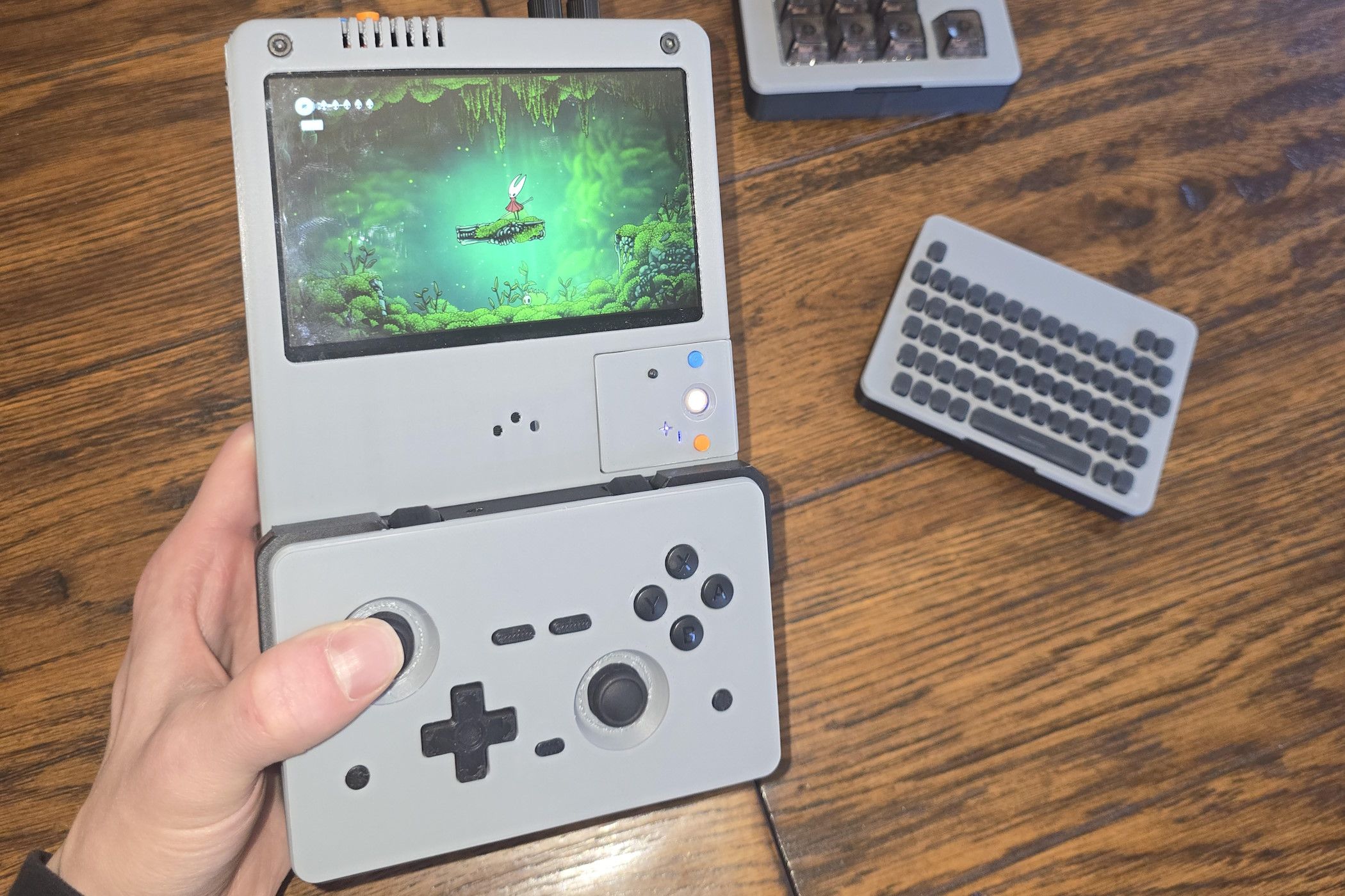 Someone built an open-source, modular x86 gaming handheld that dual ...