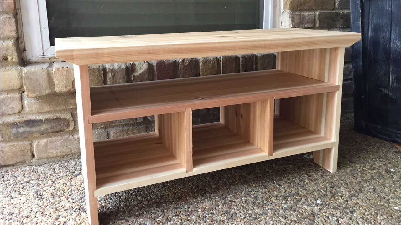 Build a small wooden bench to upgrade your porch entry