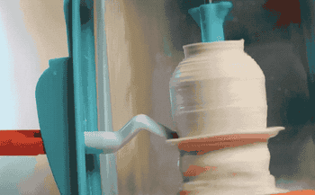 A pottery wheel incased in plastic