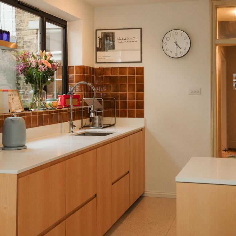 This warm minimalist kitchen proves that simplicity isn't boring