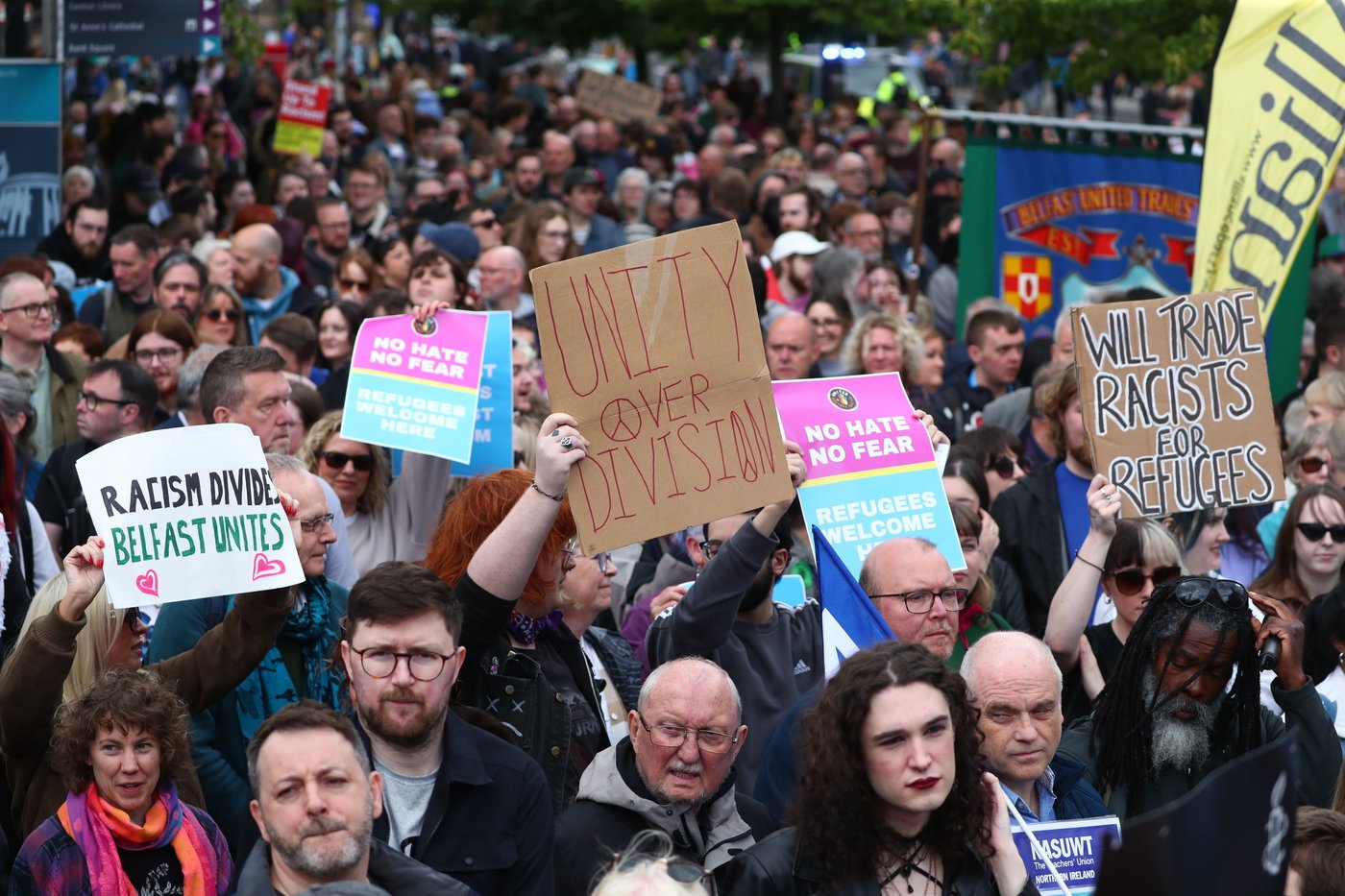 Thousands rally in Belfast to condemn anti-immigrant rioting that ...