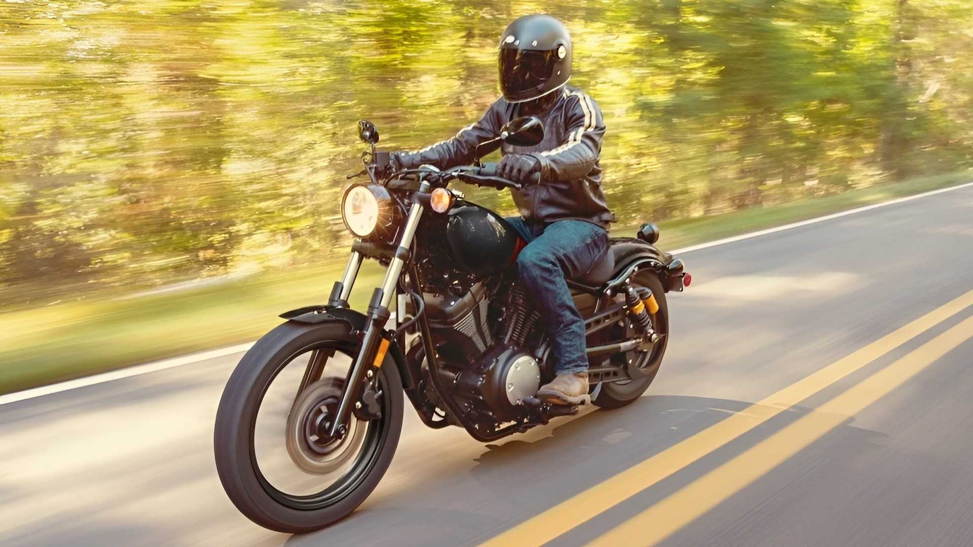 Yamaha Bolt R-Spec cruising on the road front third quarter accelerating view