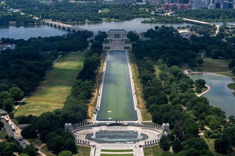 Rips appear in Reflecting Pool's new sealant after algae bloom turn ...