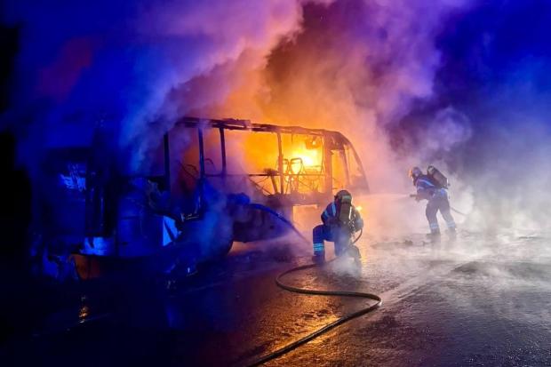 Bus destroyed after catching fire in early hours