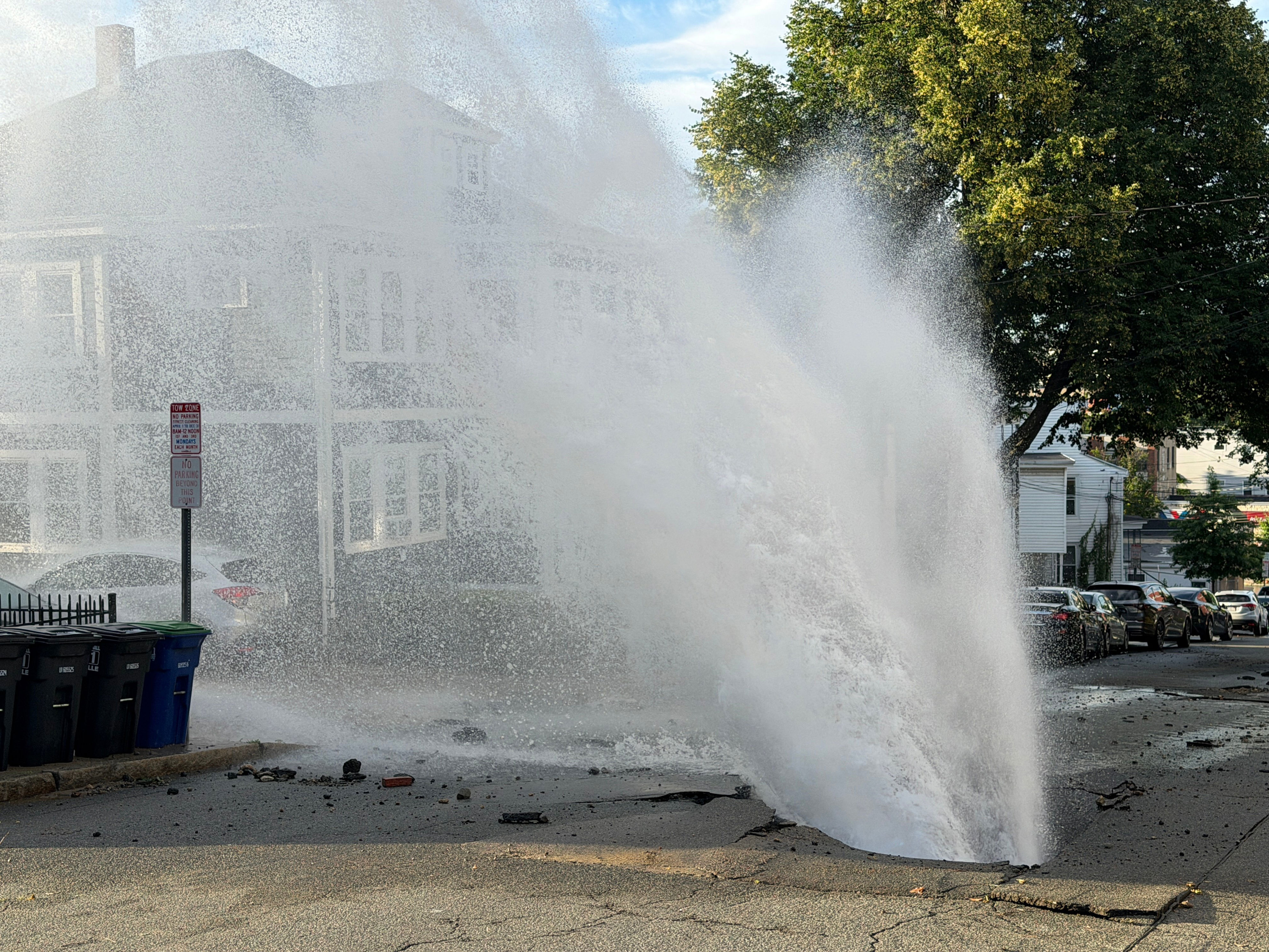 Geyser of water shoots out from water main break in Somerville
