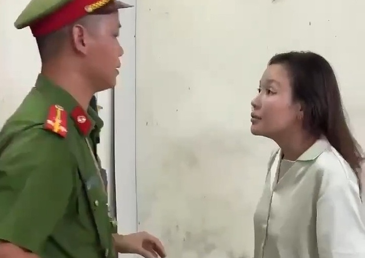 Người phụ nữ 'cắn, tát công an' bị bắt
