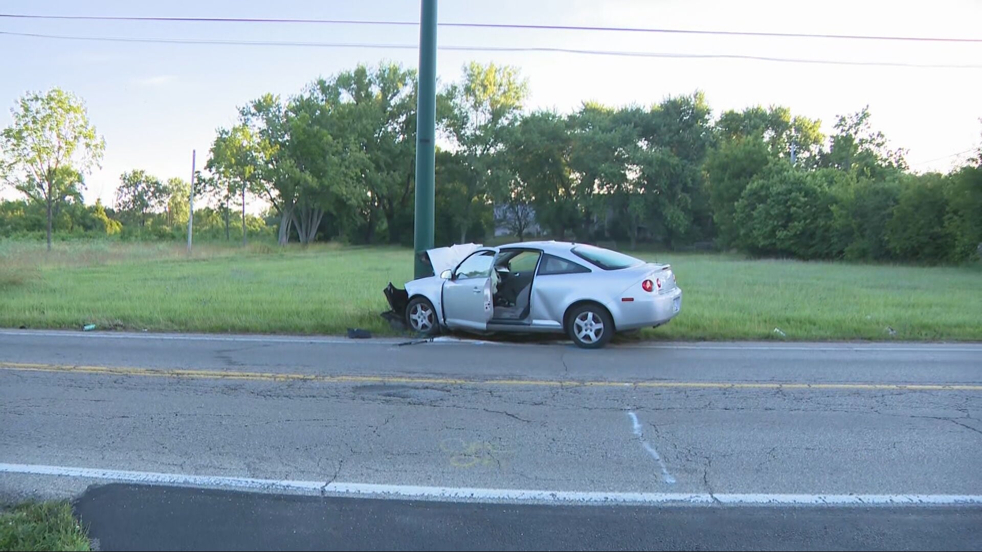Man dies after car hits utility pole on busy Dayton street