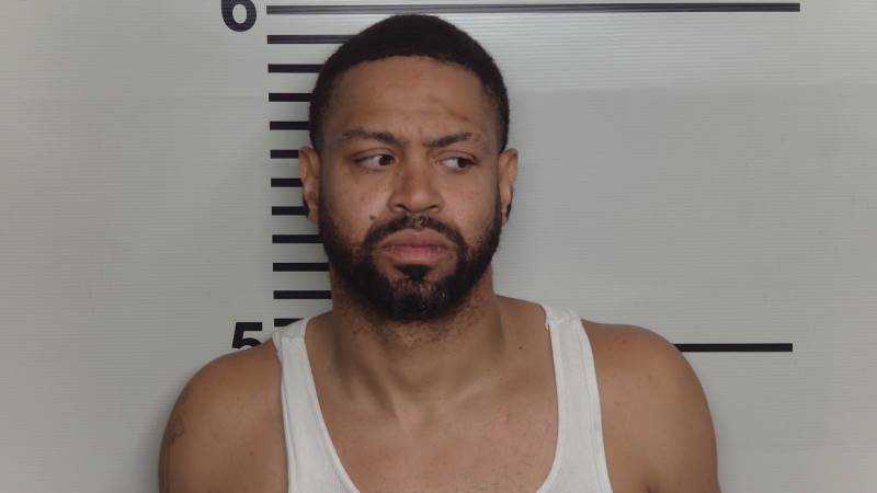 Man arrested in connection to deadly shooting in the Russell neighborhood