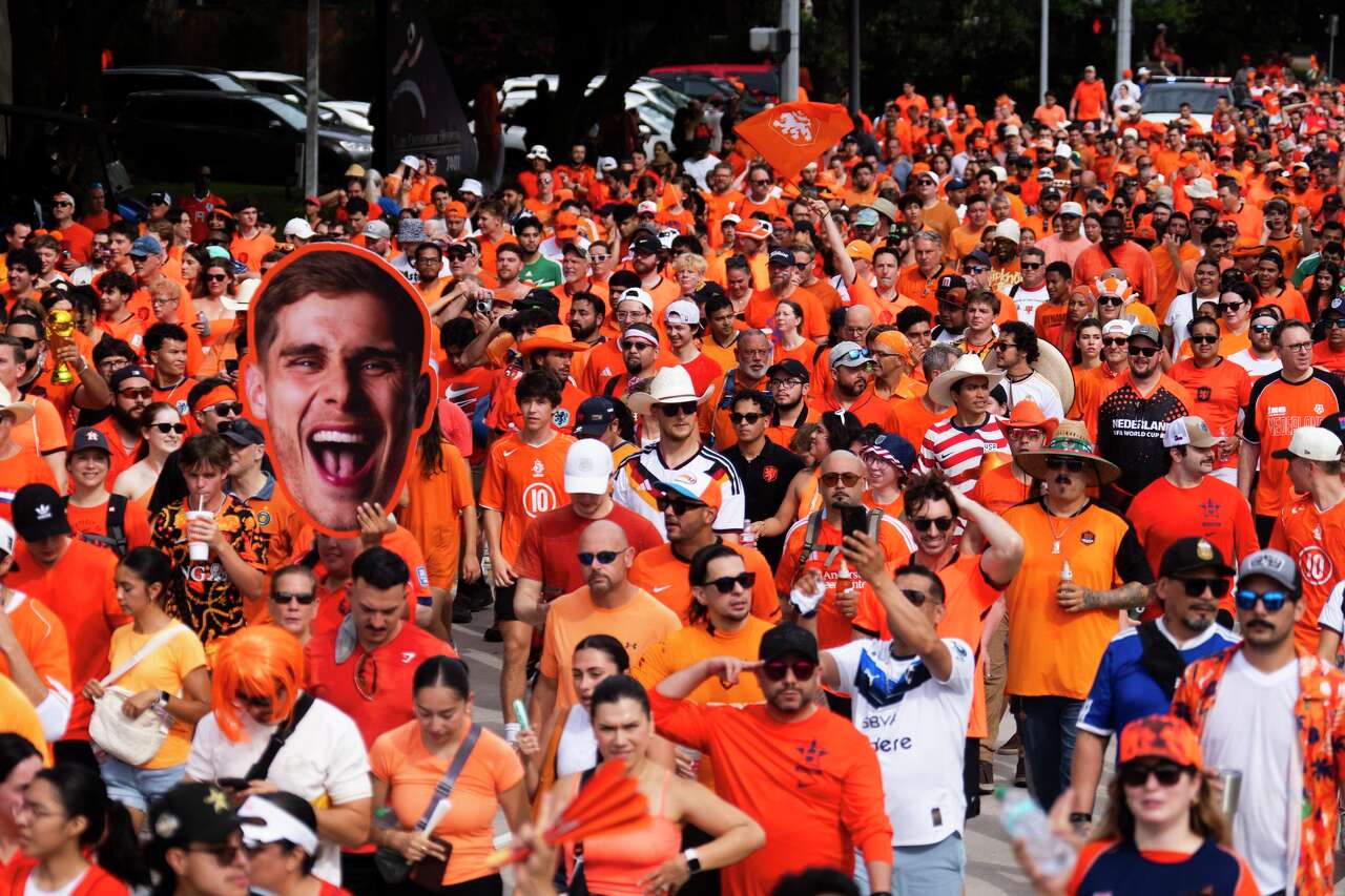 Around 20,000 fans march to Houston's NRG Stadium for Netherlands v ...