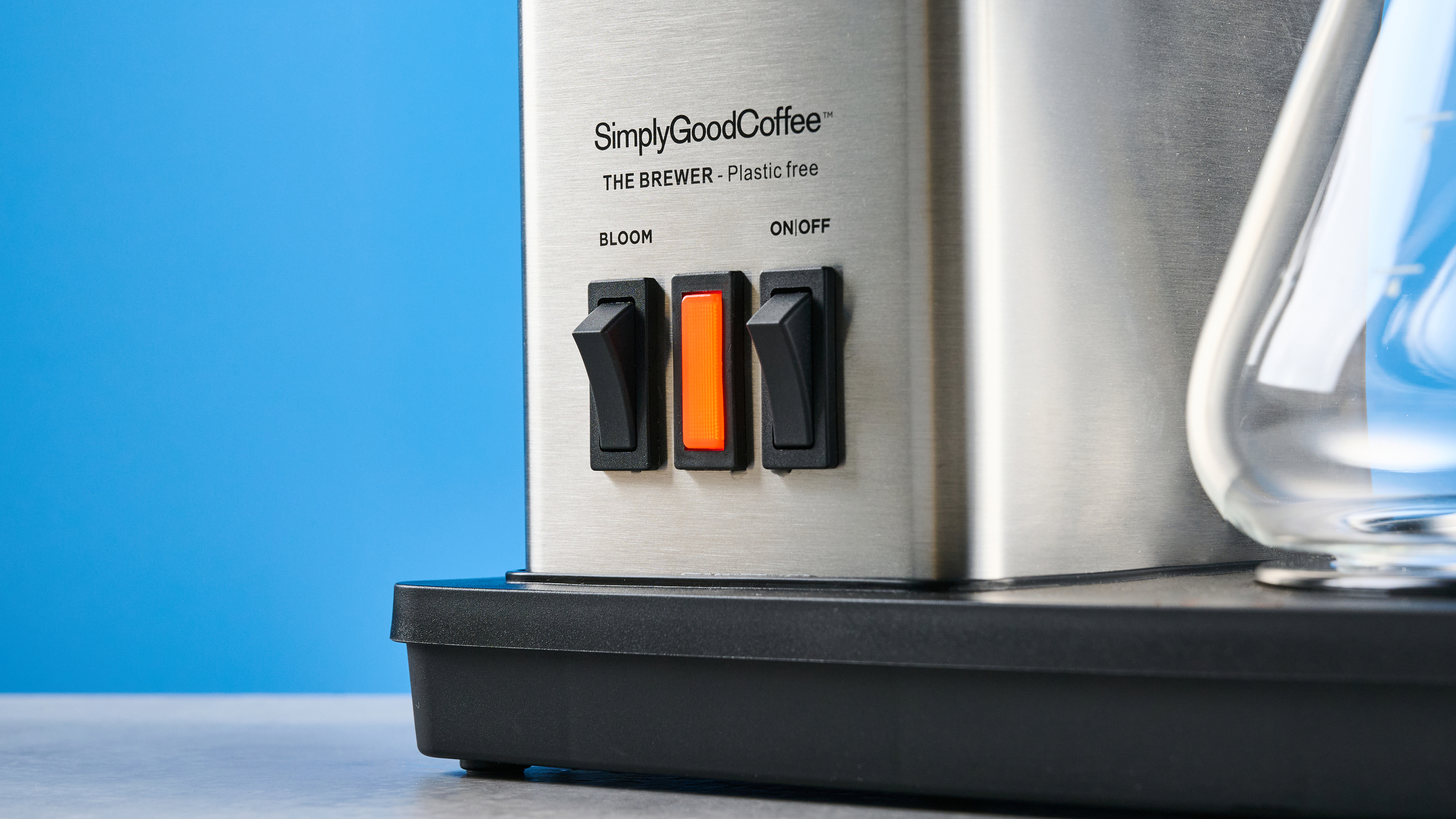 the simply good coffee plastic-free brewer photographed against the blue tom's guide backgrounds